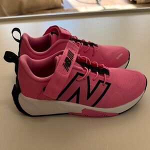 New Balance Pink and Black Sneakers